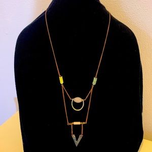 Rose gold tone necklace with beads